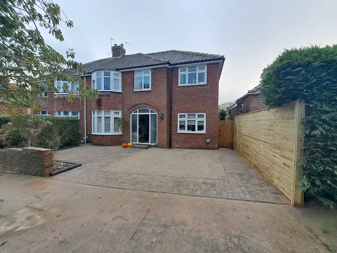 Block paving driveway with new fencing